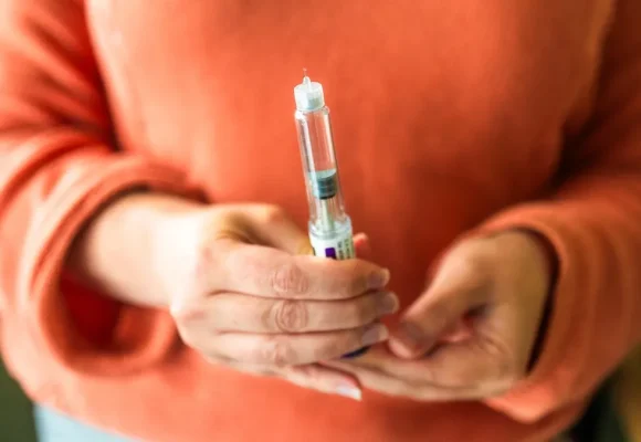 woman-holding-glp1-medications The Evolution of Modern Medicine: From Treatment to Prevention